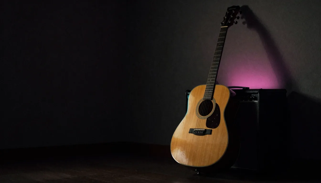 An acoustic guitar leaning against an amplifier in a warmly lit room, washed in gold and magenta light